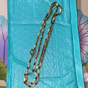 24” gold toned #11 necklace